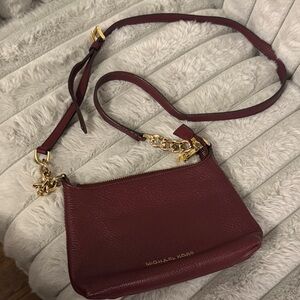 Michael Kors Wine Red Crossbody Bag with Gold Accents